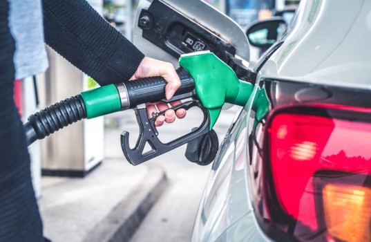 Woman,Pumping,Gasoline,Fuel,In,Car,At,Gas,Station.